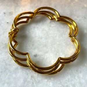 Kate Spade trio of gold wavy bangles